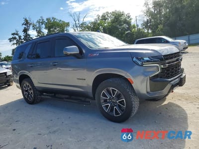 Czwarte zdjęcie samochodu z boku: 2021 CHEVROLET TAHOE K1500 Z71 VIN:1GNSKPKD2MR491059 - miniatura