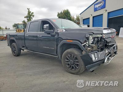 Czwarte zdjęcie samochodu z boku: 2023 GMC SIERRA K3500 DENALI VIN:1GT49WEY7PF211020 - miniatura