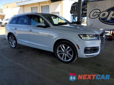 Czwarte zdjęcie samochodu z boku: 2017 AUDI Q7 PRESTIGE VIN:WA1VAAF71HD011097 - miniatura