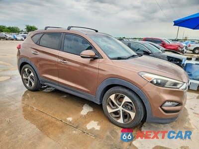 Czwarte zdjęcie samochodu z boku: 2016 HYUNDAI TUCSON LIMITED VIN:KM8J33A29GU175164 - miniatura