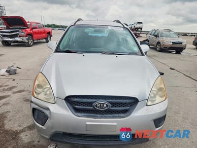 Piąte zdjęcie samochodu w środku: 2009 KIA RONDO BASE VIN:KNAFG528797271788 - miniatura