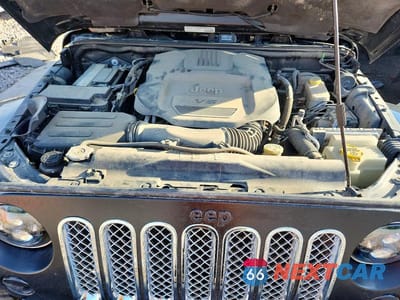 Zdjęcie 11 z 12 samochodu: 2014 JEEP WRANGLER UNLIMITED SAHARA VIN:1C4BJWEG9EL118388 - miniatura