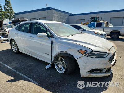 Czwarte zdjęcie samochodu z boku: 2018 FORD FUSION SE HYBRID VIN:3FA6P0LU7JR278728 - miniatura