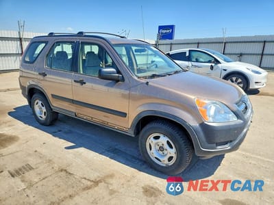 Czwarte zdjęcie samochodu z boku: 2004 HONDA CR-V LX VIN:JHLRD78444C025843 - miniatura