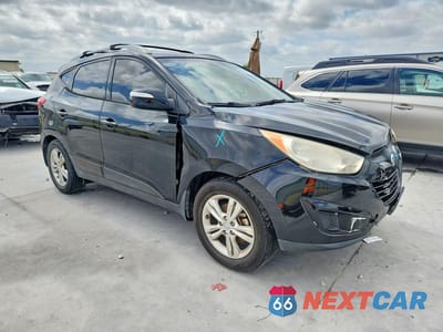 Czwarte zdjęcie samochodu z boku: 2012 HYUNDAI TUCSON GLS VIN:KM8JU3AC6CU360739 - miniatura