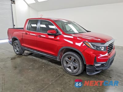 Czwarte zdjęcie samochodu z boku: 2023 HONDA RIDGELINE RTL VIN:5FPYK3F58PB041819 - miniatura