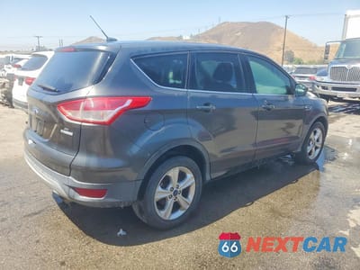 Trzecie zdjęcie samochodu z tyłu: 2016 FORD ESCAPE SE VIN:1FMCU0GX6GUC00190 - miniatura