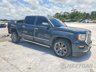 Czwarte zdjęcie samochodu z boku: 2018 GMC SIERRA K1500 DENALI VIN:3GTU2PEJ4JG209082 - miniatura