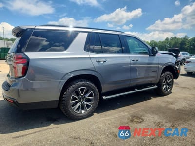 Trzecie zdjęcie samochodu z tyłu: 2021 CHEVROLET TAHOE K1500 Z71 VIN:1GNSKPKD2MR215853 - miniatura