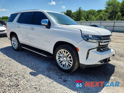 Czwarte zdjęcie samochodu z boku: 2024 CHEVROLET TAHOE K1500 PREMIER VIN:1GNSKSKD6RR106466 - miniatura