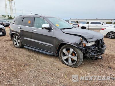 Czwarte zdjęcie samochodu z boku: 2014 JEEP GRAND CHEROKEE OVERLAND VIN:1C4RJFCG7EC328683 - miniatura