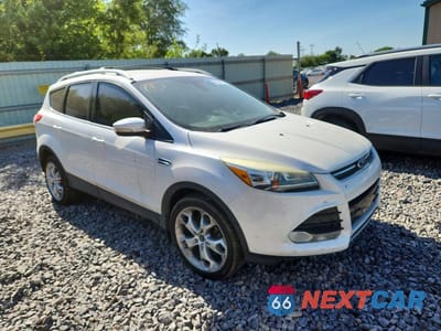 Czwarte zdjęcie samochodu z boku: 2014 FORD ESCAPE TITANIUM VIN:1FMCU9J92EUB59021 - miniatura