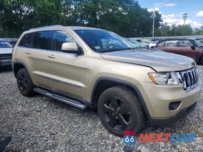 Czwarte zdjęcie samochodu z boku: 2011 JEEP GRAND CHEROKEE LAREDO VIN:1J4RR4GG7BC601151 - miniatura
