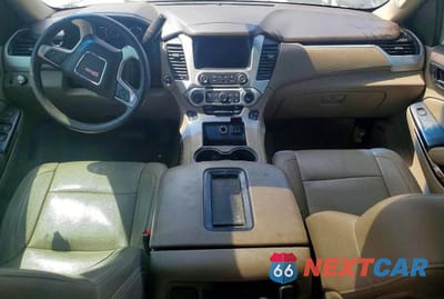 Zdjęcie 8 z 13 samochodu: 2015 GMC YUKON SLT VIN:1GKS1BKC9FR307717 - miniatura