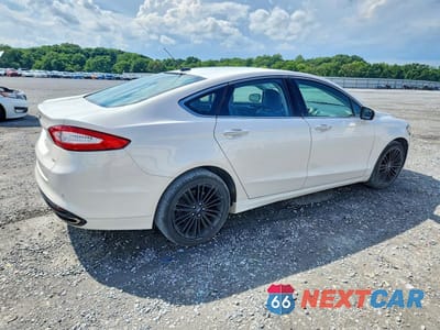Trzecie zdjęcie samochodu z tyłu: 2016 FORD FUSION SE VIN:3FA6P0H9XGR130313 - miniatura