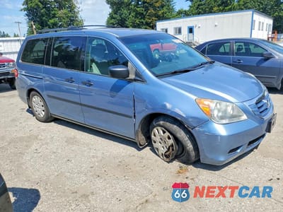 Czwarte zdjęcie samochodu z boku: 2010 HONDA ODYSSEY LX VIN:5FNRL3H21AB043609 - miniatura