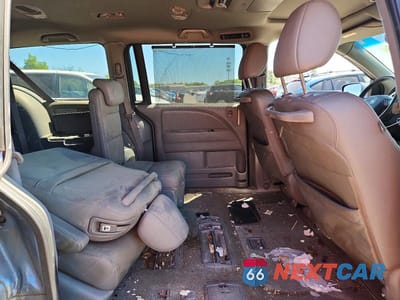 Zdjęcie 10 z 12 samochodu: 2010 HONDA ODYSSEY TOURING VIN:5FNRL3H90AB091017 - miniatura