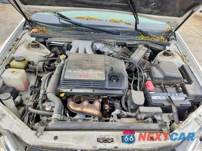 Zdjęcie 11 z 12 samochodu: 2002 TOYOTA AVALON XL VIN:4T1BF28B22U251943 - miniatura