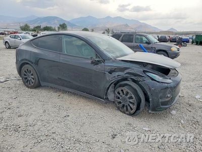 Czwarte zdjęcie samochodu z boku: 2022 TESLA MODEL Y VIN:7SAYGDEEXNF558895 - miniatura