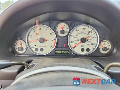 Zdjęcie 9 z 12 samochodu: 2004 MAZDA MX-5 MIATA BASE VIN:JM1NB353840410104 - miniatura