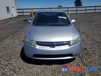 Piąte zdjęcie samochodu w środku: 2006 HONDA CIVIC LX VIN:1HGFA165X6L003397 - miniatura