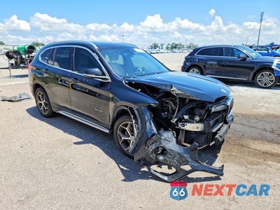 Czwarte zdjęcie samochodu z boku: 2016 BMW X1 XDRIVE28I VIN:WBXHT3C3XGP884728 - miniatura