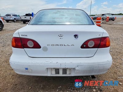 Zdjęcie 6 z 12 samochodu: 2001 TOYOTA COROLLA LE VIN:1NXBR12E31Z462930 - miniatura