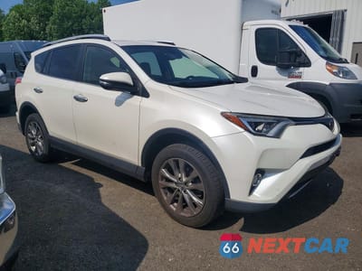 Czwarte zdjęcie samochodu z boku: 2016 TOYOTA RAV4 LIMITED VIN:JTMDFREVXGJ054886 - miniatura