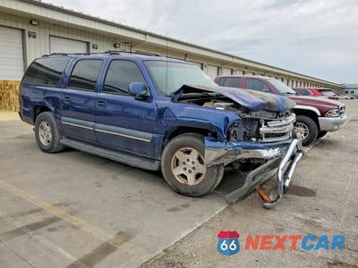 Czwarte zdjęcie samochodu z boku: 2003 CHEVROLET SUBURBAN K1500 VIN:1GNFK16ZX3J248892 - miniatura