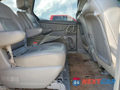 Zdjęcie 11 z 13 samochodu: 2010 TOYOTA SIENNA XLE VIN:5TDYK4CC0AS329662 - miniatura