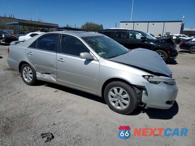 Czwarte zdjęcie samochodu z boku: 2004 TOYOTA CAMRY XLE V6 VIN:4T1BF32K94U575666 - miniatura