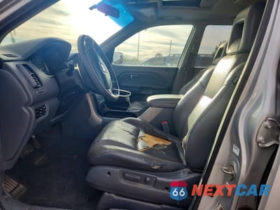 Zdjęcie 7 z 13 samochodu: 2005 HONDA PILOT EXL VIN:2HKYF18695H508266 - miniatura