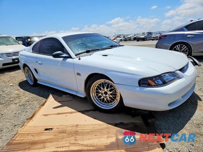 Czwarte zdjęcie samochodu z boku: 1994 FORD MUSTANG GT VIN:1FALP42T2RF236530 - miniatura