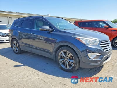 Czwarte zdjęcie samochodu z boku: 2016 HYUNDAI SANTA FE SE VIN:KM8SR4HF3GU139827 - miniatura
