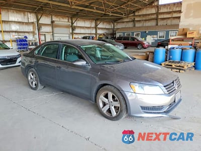 Czwarte zdjęcie samochodu z boku: 2012 VOLKSWAGEN PASSAT SE VIN:1VWBP7A31CC043493 - miniatura