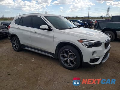 Czwarte zdjęcie samochodu z boku: 2018 BMW X1 SDRIVE28I VIN:WBXHU7C31J5L07089 - miniatura