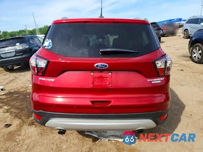 Zdjęcie 6 z 13 samochodu: 2018 FORD ESCAPE TITANIUM VIN:1FMCU0J90JUD03378 - miniatura