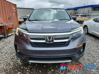 Piąte zdjęcie samochodu w środku: 2021 HONDA PILOT EXL VIN:5FNYF5H56MB033316 - miniatura