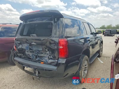Trzecie zdjęcie samochodu z tyłu: 2018 CHEVROLET TAHOE C1500 LT VIN:1GNSCBKC3JR222250 - miniatura