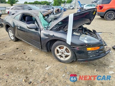 Czwarte zdjęcie samochodu z boku: 2002 MITSUBISHI ECLIPSE RS VIN:4A3AC34GX2E059659 - miniatura