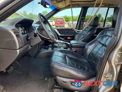 Zdjęcie 7 z 13 samochodu: 2001 JEEP GRAND CHEROKEE LIMITED VIN:1J4GW58N41C515474 - miniatura