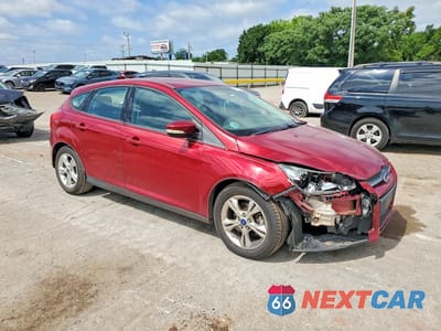 Czwarte zdjęcie samochodu z boku: 2014 FORD FOCUS SE VIN:1FADP3K26EL375528 - miniatura