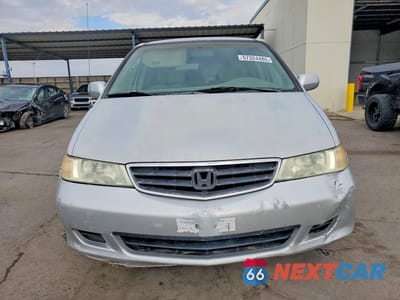 Piąte zdjęcie samochodu w środku: 2002 HONDA ODYSSEY EX VIN:2HKRL18652H547011 - miniatura