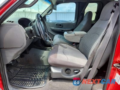 Zdjęcie 7 z 12 samochodu: 2000 FORD F150 VIN:1FTRX18L5YKB02966 - miniatura