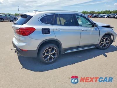 Trzecie zdjęcie samochodu z tyłu: 2018 BMW X1 XDRIVE28I VIN:WBXHT3C38J3H30536 - miniatura