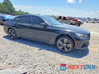 Czwarte zdjęcie samochodu z boku: 2019 BMW 740 I VIN:WBA7E2C52KB217704 - miniatura