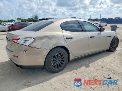 Trzecie zdjęcie samochodu z tyłu: 2014 MASERATI GHIBLI S VIN:ZAM57RTAXE1088756 - miniatura