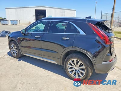 Drugie zdjęcie samochodu z przodu: 2022 CADILLAC XT4 PREMIUM LUXURY VIN:1GYFZDR49NF100125 - miniatura