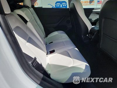 Zdjęcie 10 z 12 samochodu: 2023 TESLA MODEL Y VIN:7SAYGDEE6PF672573 - miniatura