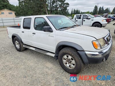 Czwarte zdjęcie samochodu z boku: 2000 NISSAN FRONTIER XE VIN:1N6ED27TXYC385287 - miniatura
